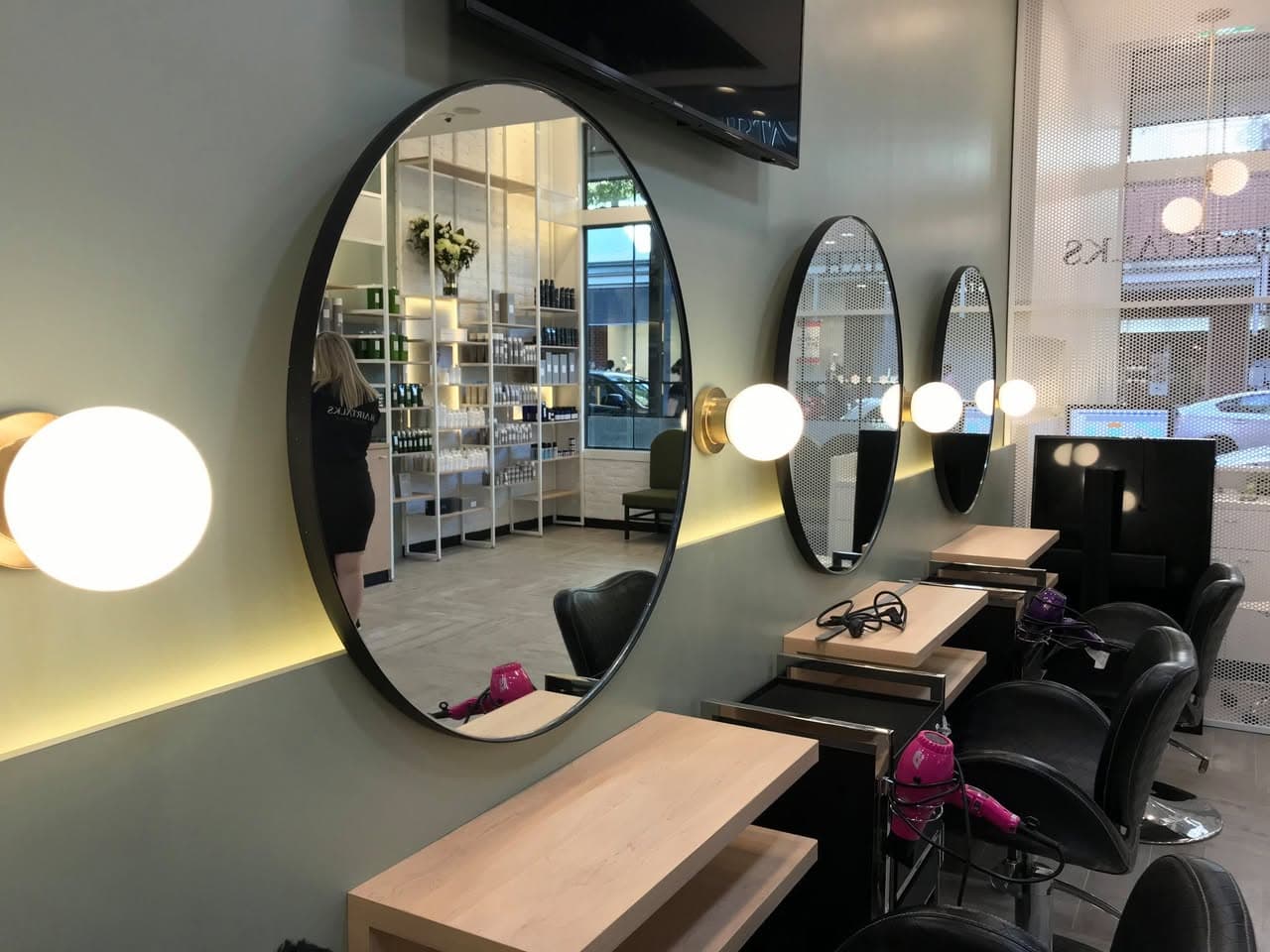 Round mirror styling stations at Hair Talks Rouse Hill