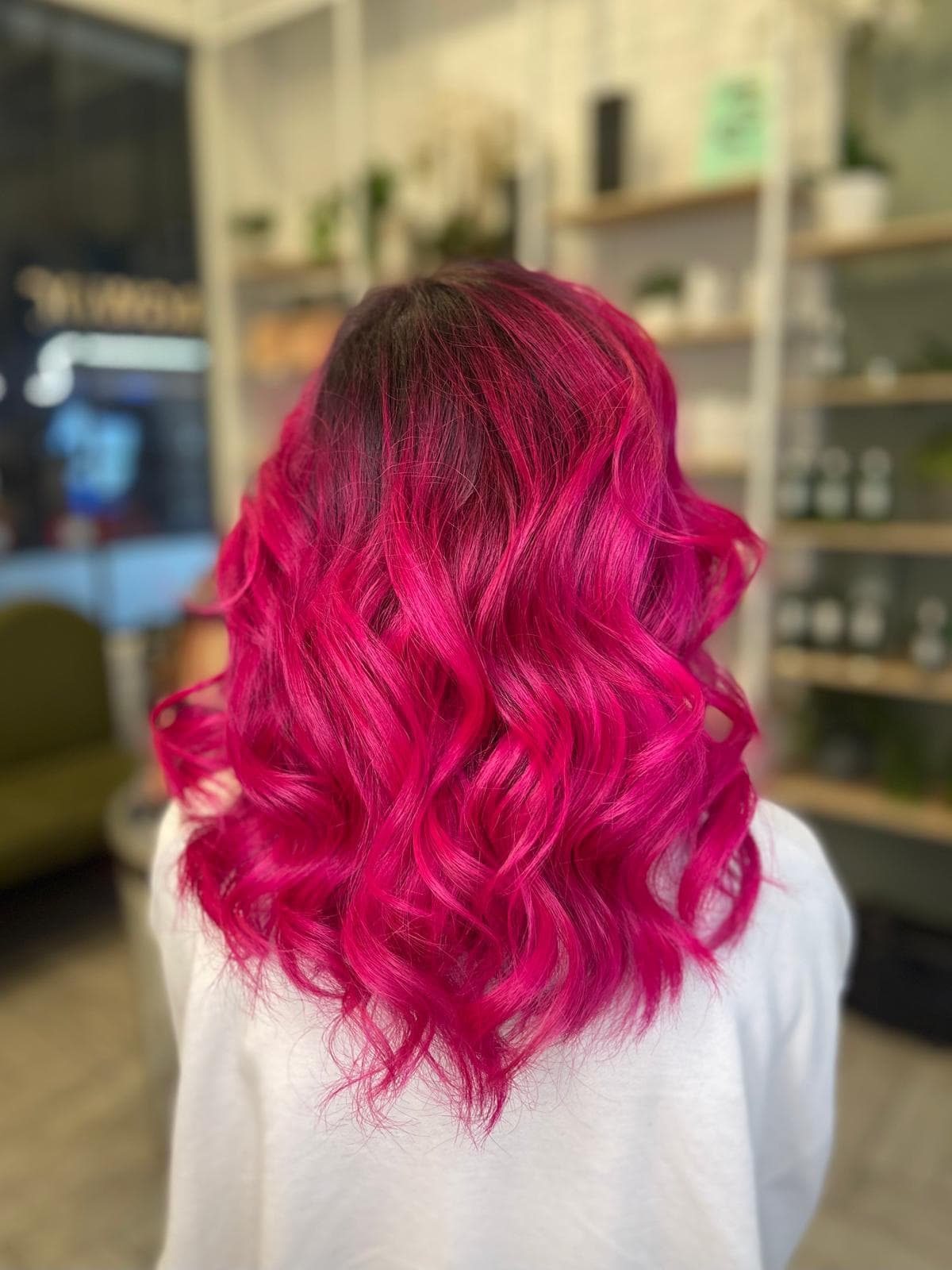 Vivid magenta curled colour by Ryan at Hair Talks Rouse Hill